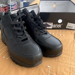 Brand new Black pair of size 12 mountain gear work boots